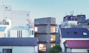 Nhà xếp chồng khối với vỏ gỗ bần thân thiện môi trường